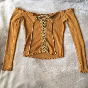 Off the shoulder, lace up shirt